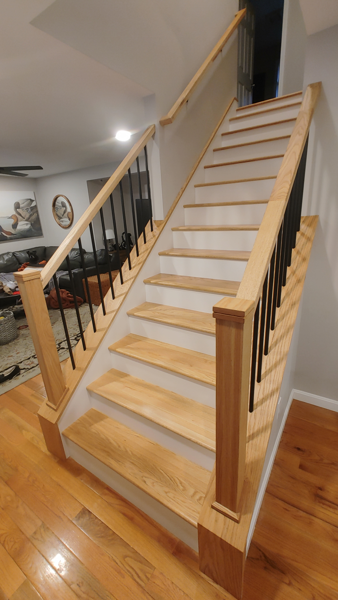 Custom red oak staircase built by Valley Builders in New Hampshire